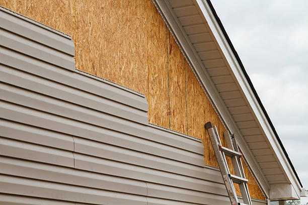 Professional Siding Repair technician working in State College, PA